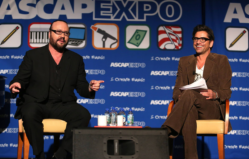 (Hit songwriter Desmond Child chats with actor/musician John Stamos at the ASCAP Expo)