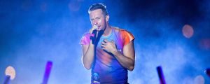 Chris Martin Seen Serenading Dakota Johnson During Coldplay Gig