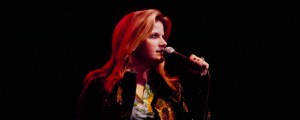 The Meaning Behind Trisha Yearwood’s Heartfelt Debut Single “She’s in Love With the Boy”