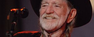 Listen to Willie Nelson Transform The Iconic Beatles Song “One After 909”