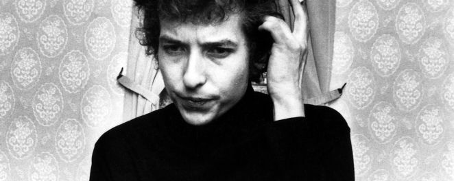 Bob Dylan scratching head, smoking cigarette