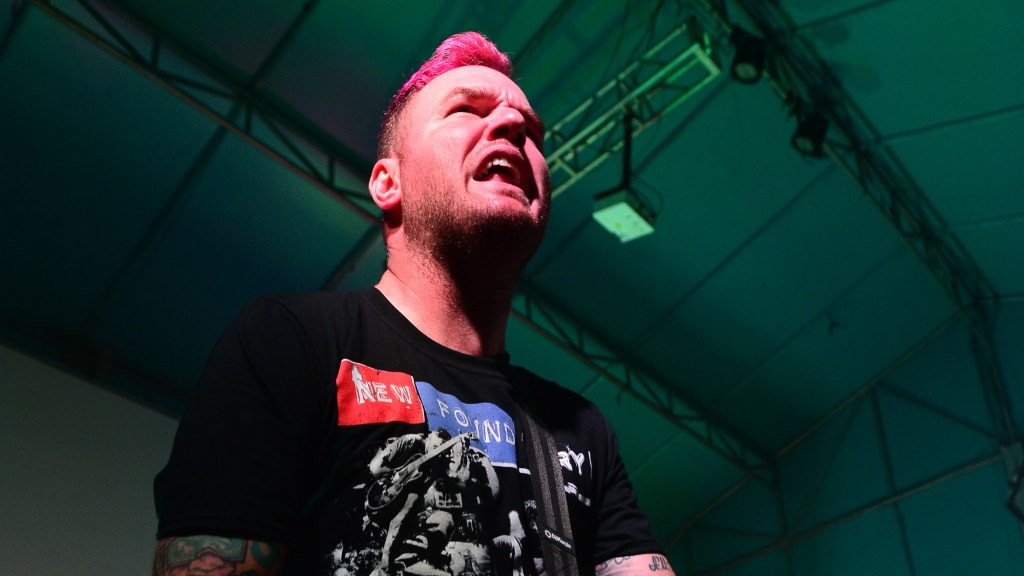 Founding Member of Pioneering 2000s Rock Band Makes Emotional Return to the Stage in a Wheelchair Amid Cancer Battle