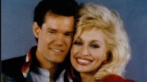 Randy Travis’ Emotional Goodbye to Dolly Parton Will Leave You in Tears: “Now, It’s Your Turn to Dance With Carl”