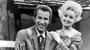 Get Your Tissues and Watch a Young Dolly Parton Join Porter Wagoner To Perform Their First Hit Duet in Their 1967 Grand Ole Opry Debut as a Duo