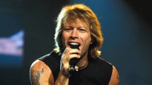On This Day in 1990, Jon Bon Jovi Hit No. 1 With His Debut Solo Single—Written for the Emilio Estevez-Led Western That Gave Him His First Acting Gig