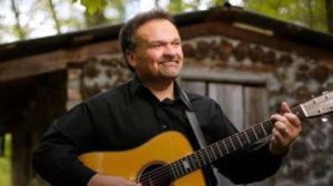 Born 64 Years Ago Today in Tennessee, the Beloved Singer-Songwriter Who Fronted Not One, but Two Award-Winning Bluegrass Bands